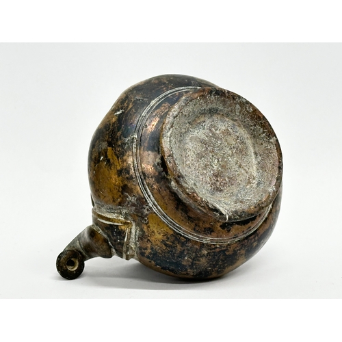 39 - An 18th Century bronze Lota Vessle. 10x9x7cm