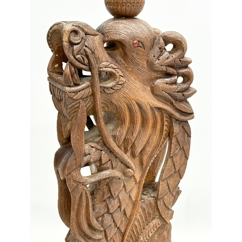 40 - A pair of Early 20th Century Chinese carved teak dragon table lamps. Circa 1920-1930. 15x14x43cm