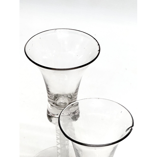 45 - Two 18th Century George III wine glasses with air twist stems. Circa 1760-1780. 17cm. 15cm