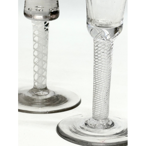 45 - Two 18th Century George III wine glasses with air twist stems. Circa 1760-1780. 17cm. 15cm