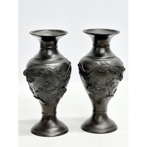 23 - Kyoto workshop. A pair of Japanese bronze Meiji Period baluster vases. Birds in flight and lotus lea... 