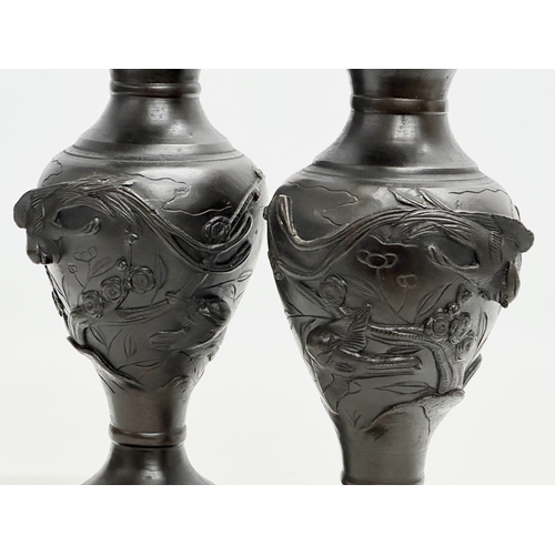 23 - Kyoto workshop. A pair of Japanese bronze Meiji Period baluster vases. Birds in flight and lotus lea... 