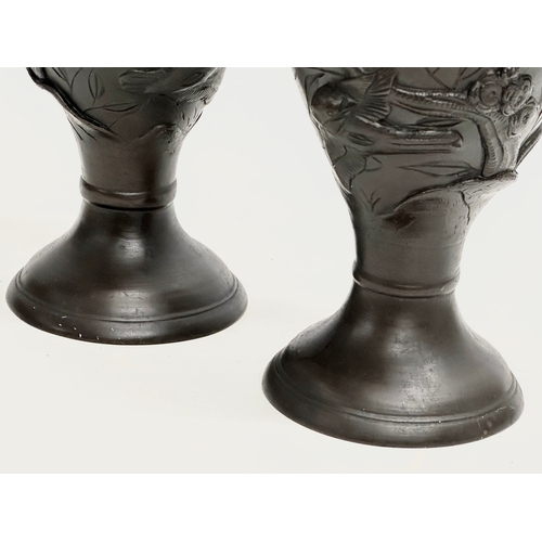 23 - Kyoto workshop. A pair of Japanese bronze Meiji Period baluster vases. Birds in flight and lotus lea... 