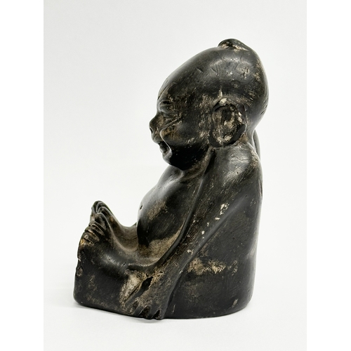 42 - An Early 20th Century carved stone Billiken. 7x6x10cm