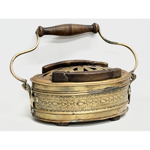 56 - A 19th Century engraved brass carriage foot warmer. 31x15cm