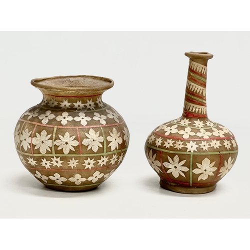 73 - Two 19th/Early 20th Century vases made from animal skin. 9x15cm. 12x11cm.