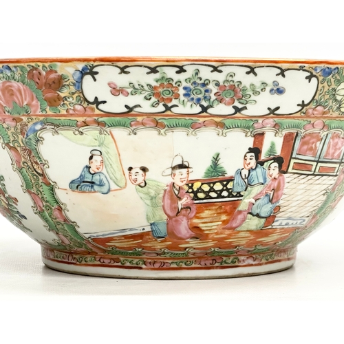 13 - A Chinese Export Rose Medallion punch bowl. Late Qing Dynasty. Emperor Guangxu. Decorated with Guang... 