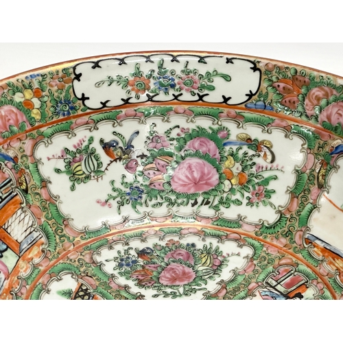 13 - A Chinese Export Rose Medallion punch bowl. Late Qing Dynasty. Emperor Guangxu. Decorated with Guang... 