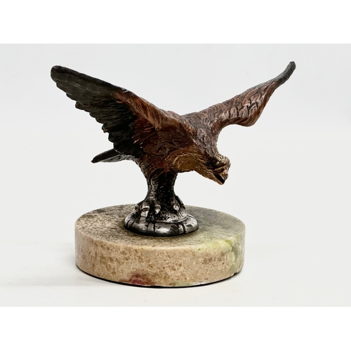 115 - A Late 19th/Early 20th Century cold painted bronze eagle on marble base. 15.5x11x11cm.