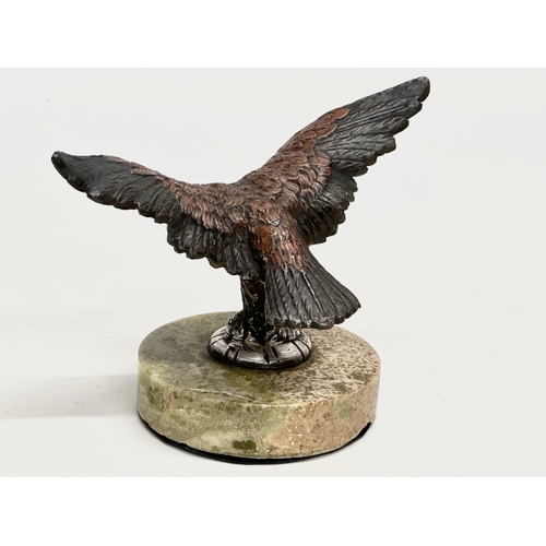 115 - A Late 19th/Early 20th Century cold painted bronze eagle on marble base. 15.5x11x11cm.