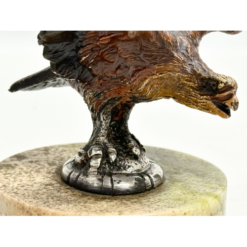 115 - A Late 19th/Early 20th Century cold painted bronze eagle on marble base. 15.5x11x11cm.