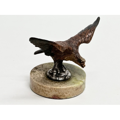 115 - A Late 19th/Early 20th Century cold painted bronze eagle on marble base. 15.5x11x11cm.