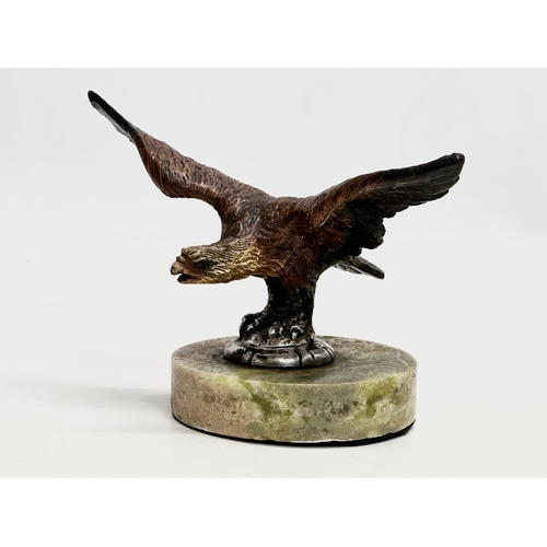 115 - A Late 19th/Early 20th Century cold painted bronze eagle on marble base. 15.5x11x11cm.