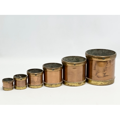 53 - A set of 6 Late 19th Century copper and brass measures. 14.5x14cm. 11.5x11cm. 9x9cm.