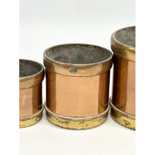 53 - A set of 6 Late 19th Century copper and brass measures. 14.5x14cm. 11.5x11cm. 9x9cm.