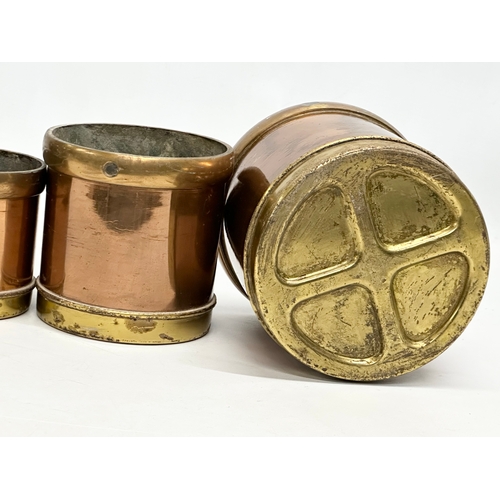 53 - A set of 6 Late 19th Century copper and brass measures. 14.5x14cm. 11.5x11cm. 9x9cm.