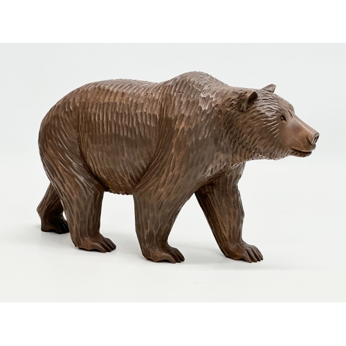 121 - A large Early 20th Century Black Forest style bear. Probably Russian. 30x17cm.