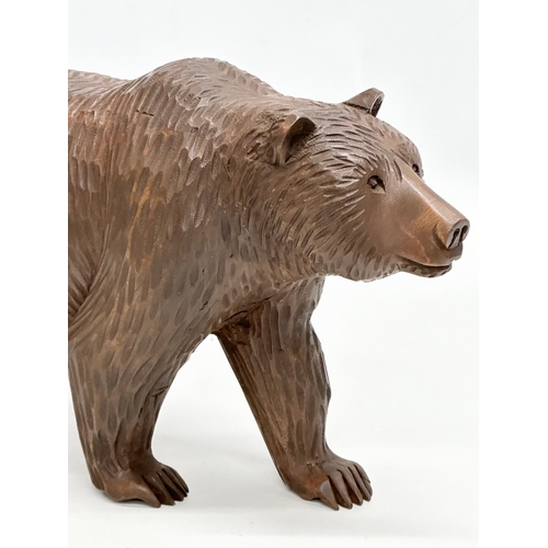 121 - A large Early 20th Century Black Forest style bear. Probably Russian. 30x17cm.