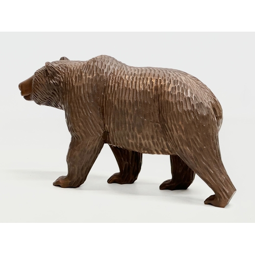 121 - A large Early 20th Century Black Forest style bear. Probably Russian. 30x17cm.