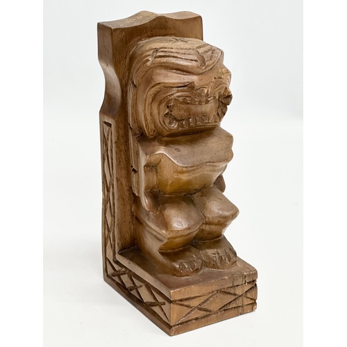 536 - A pair of Mid 20th Century Tiki Monkeypod bookends. 19.5cm.