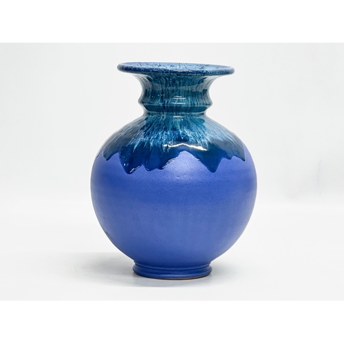 546 - A Mid Century glazed vase by Raia. 17x21cm.