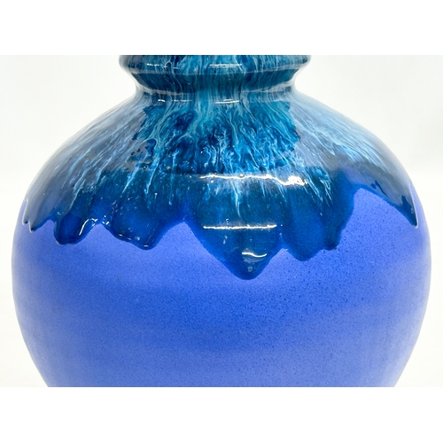 546 - A Mid Century glazed vase by Raia. 17x21cm.