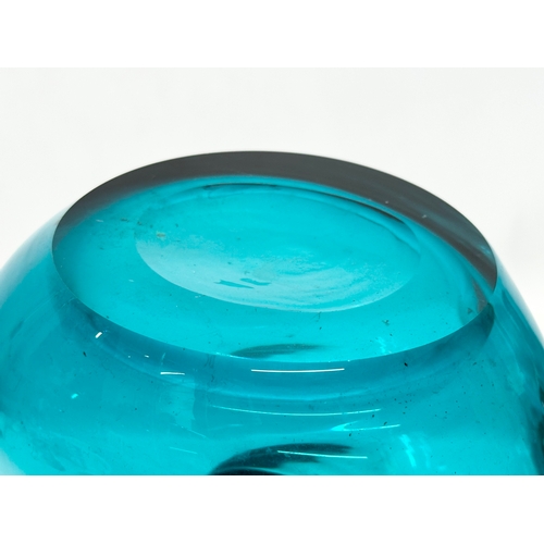 97 - A Mid Century aqua glass carafe style vase. In the manner of Fulvio Bianconi. 16x29cm