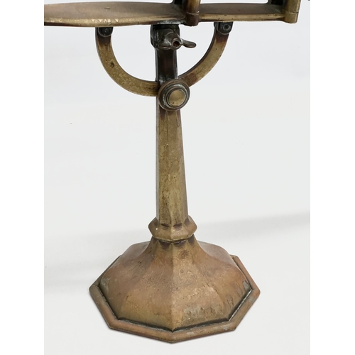 126 - A 19th Century Victorian brass mechanical bellows. 50x45cm.