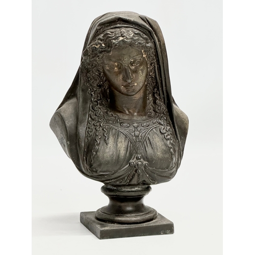 148 - A pair of Late 19th Century religious spelter busts. Jesus and Mary. 14x22cm.