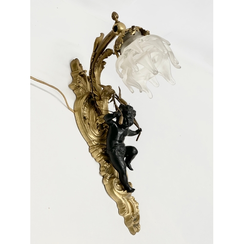 44 - A good quality bronze and brass, rococo style and cherub wall light. 43x28cm