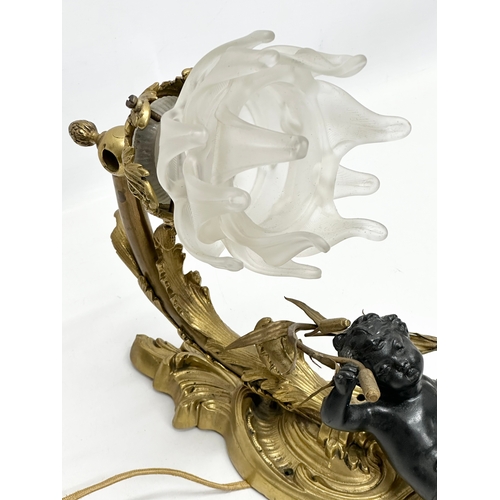 44 - A good quality bronze and brass, rococo style and cherub wall light. 43x28cm