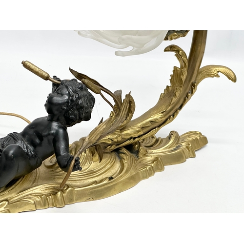 44 - A good quality bronze and brass, rococo style and cherub wall light. 43x28cm