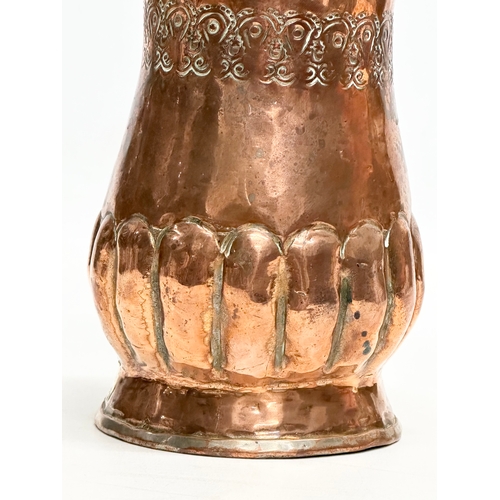 129 - A Late 19th Century Middle Eastern engraved copper vase. 10.5x16cm.