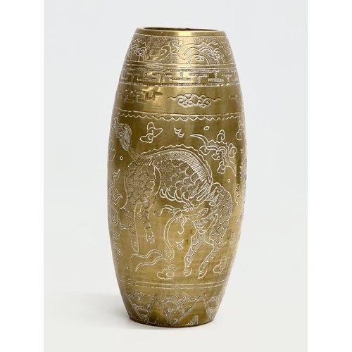 198 - An Early 20th Century Chinese engraved brass vase. Emperor Xuande mark. 20cm