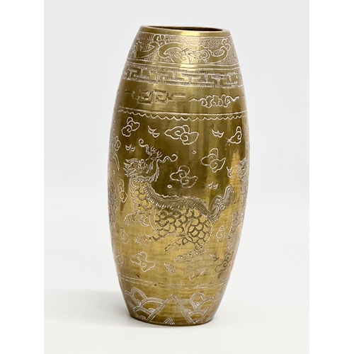 198 - An Early 20th Century Chinese engraved brass vase. Emperor Xuande mark. 20cm