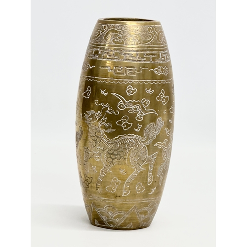 198 - An Early 20th Century Chinese engraved brass vase. Emperor Xuande mark. 20cm