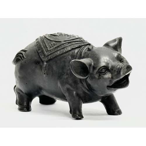 79 - A Chinese carved stone pig. 13x8cm.