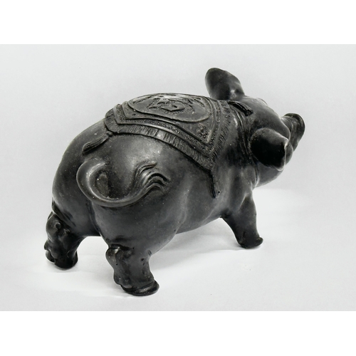 79 - A Chinese carved stone pig. 13x8cm.