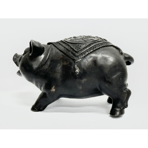 79 - A Chinese carved stone pig. 13x8cm.