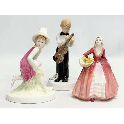 907 - Three Royal Doulton figurines. A Royal Doulton “Janet” figurine, copr 1932, HN1537. A Royal Doulton ... 