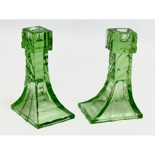 564 - A 1930’s Art Deco uranium glass dressing table set. Tray 30x20cm.