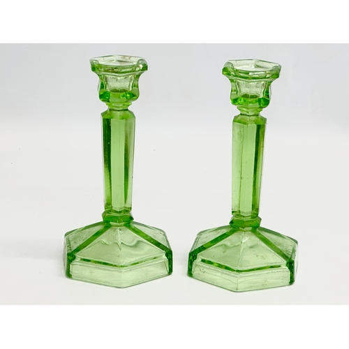 564 - A 1930’s Art Deco uranium glass dressing table set. Tray 30x20cm.