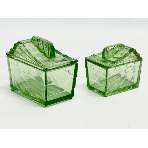 564 - A 1930’s Art Deco uranium glass dressing table set. Tray 30x20cm.