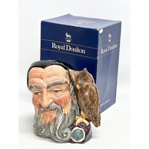 908 - 5 character toby jugs. A large Royal Doulton “Merlin” character jug with box. A large Royal Doulton ... 