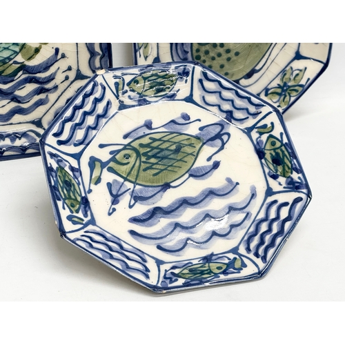 697 - A set of 3 Mid 20th Century delftware plates. Probably French. 20cm