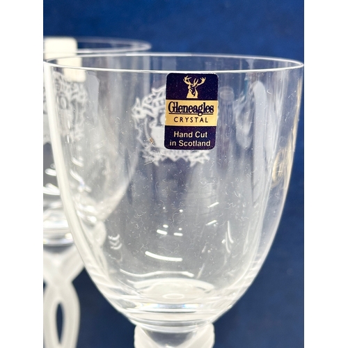 911 - A set of 4 Gleneagles Crystal wine glasses with frosted glass stems. With box. 19cm.