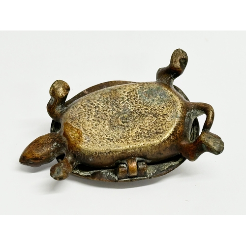 550 - A Late 19th Century Victorian brass turtle shaped trinket box/inkwell. 11x6.5cm.