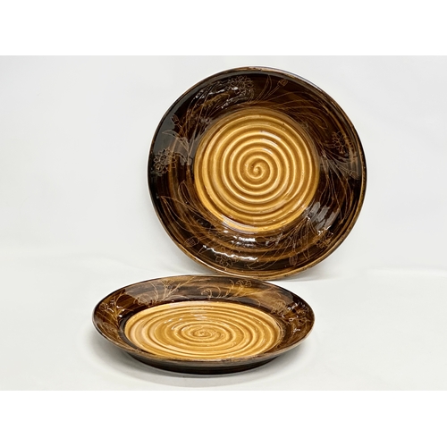 699 - Two large Mid Century glazed stoneware centrepiece bowls. Marked Grubb. 1975. 43x7cm. 40x5cm.