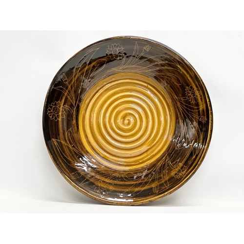 699 - Two large Mid Century glazed stoneware centrepiece bowls. Marked Grubb. 1975. 43x7cm. 40x5cm.