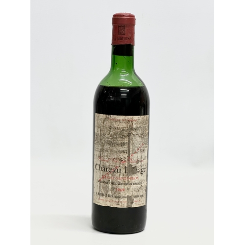 568 - A bottle of 1969 Chateau Lestage wine.